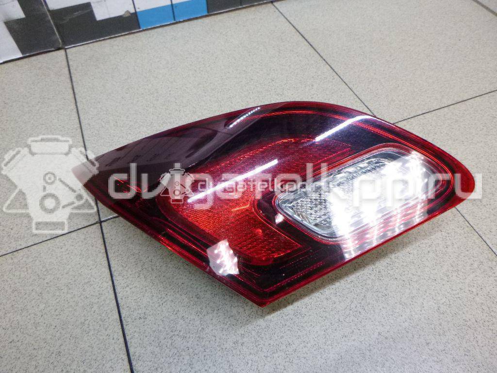 Фото Фонарь задний внутренний левый  13360793 для Opel Astra {forloop.counter}}
