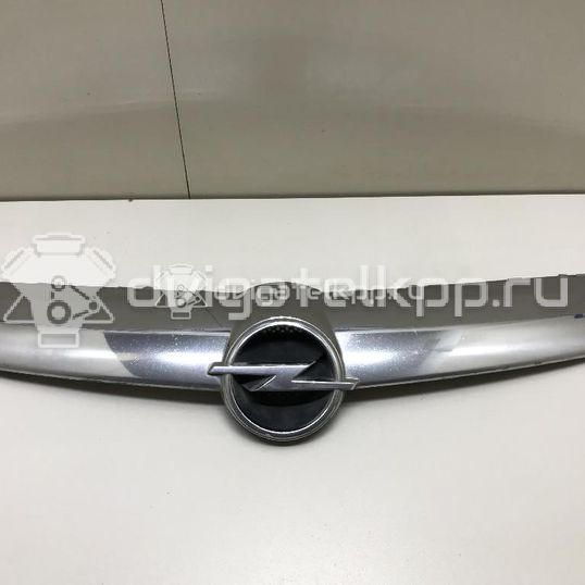Фото Накладка на решетку радиатора  13211576 для Opel Corsa
