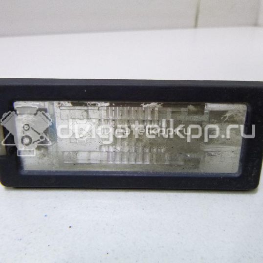 Фото Фонарь подсветки номера  8200013577 для Renault Modus Grand F Jp0 / Megane / Clio / Laguna / Scénic