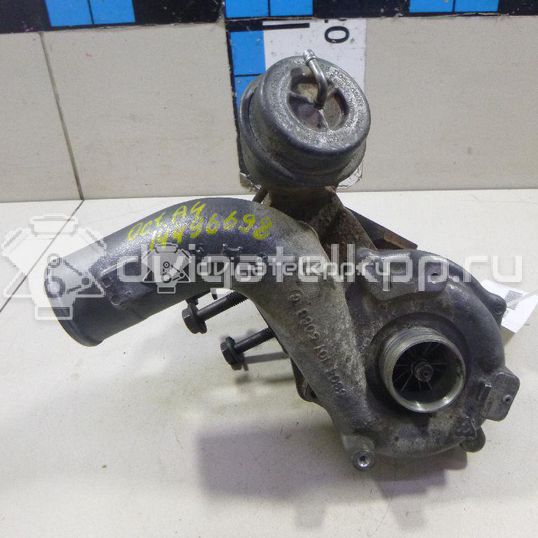 Фото Турбокомпрессор (турбина)  06A145704 для Volkswagen Bora / New Beetle / Golf