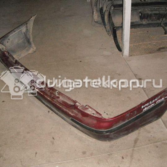 Фото Бампер задний  BJ1V50221B для Mazda 323