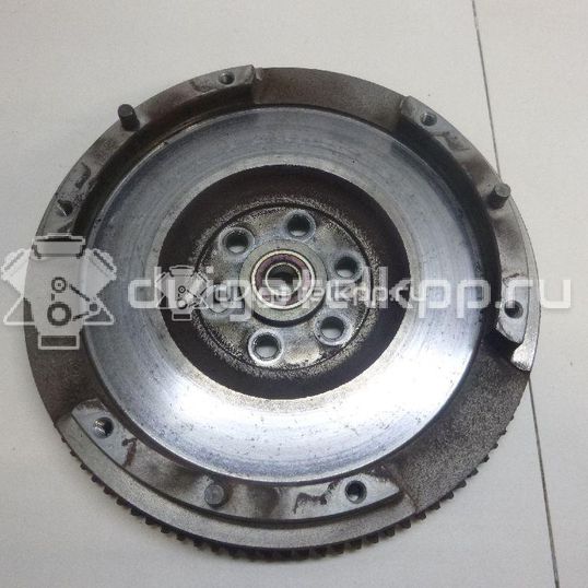 Фото Маховик для двигателя K12B для Suzuki / Mitsubishi / Vauxhall 86-94 л.с 16V 1.2 л бензин 1262051K00