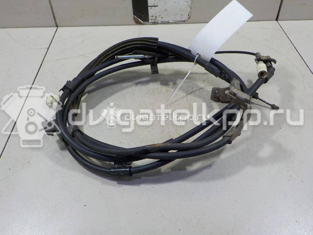 Фото Трос стояночного тормоза  1755767 для Ford Focus / C-Max {forloop.counter}}