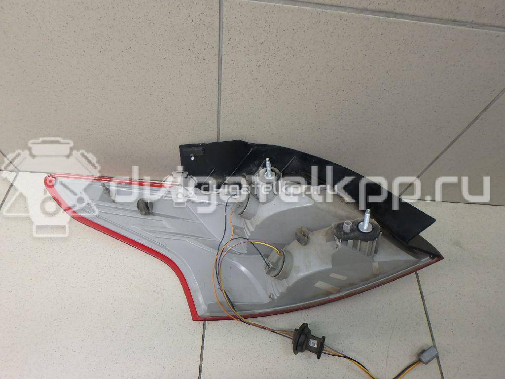 Фото Фонарь задний наружный правый  1863057 для Ford Focus {forloop.counter}}