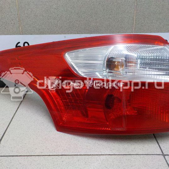 Фото Фонарь задний наружный левый  1785514 для Ford Focus