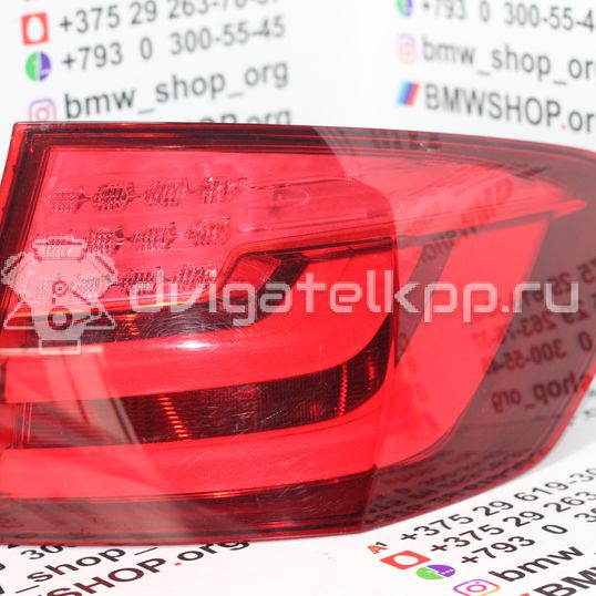 Фото Фонарь задний наружный правый  7203234 для Bmw 5