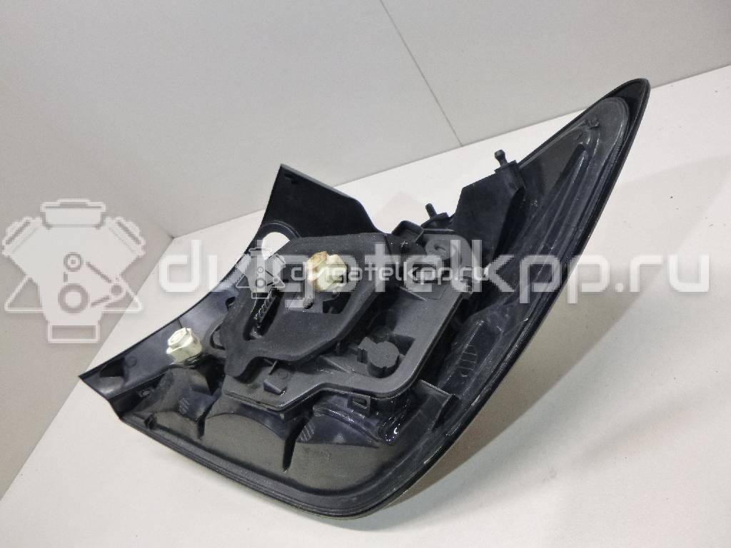 Фото Фонарь задний левый  93183055 для Opel Astra {forloop.counter}}