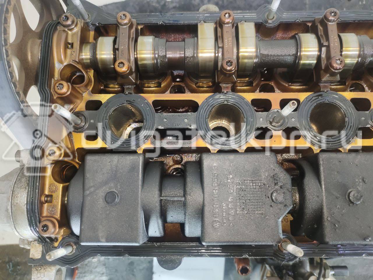 Фото Контрактный (б/у) двигатель BFB для Audi A4 163 л.с 20V 1.8 л бензин 06B100098LX {forloop.counter}}