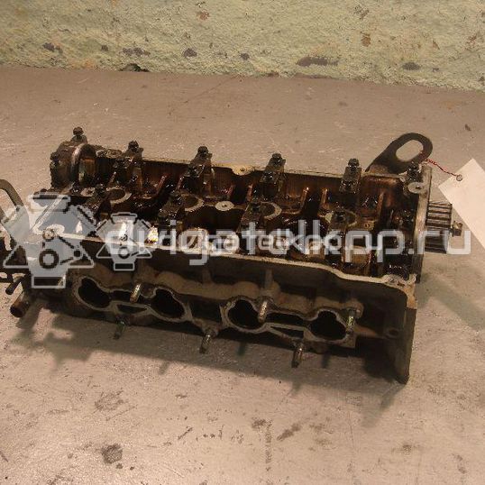 Фото Головка блока  Z50110100 для mazda 323 (BA)