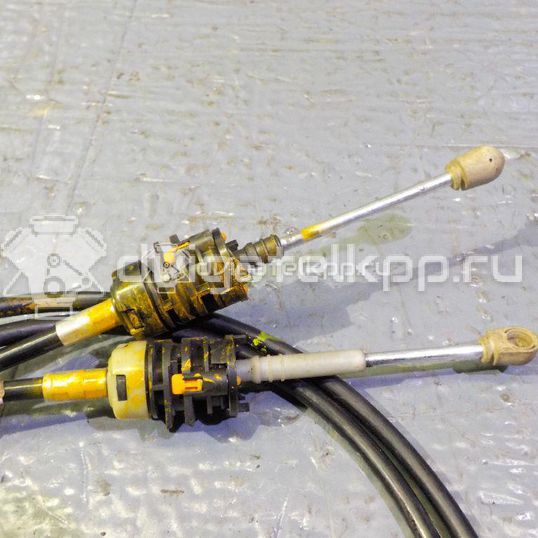 Фото Трос КПП  2S6R7E395AE для mazda Mazda 2 (DY)