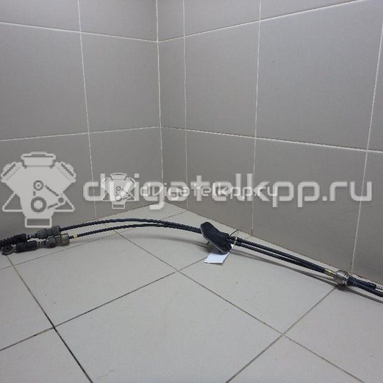 Фото Трос КПП  2S6R7E395AE для mazda Mazda 2 (DY)