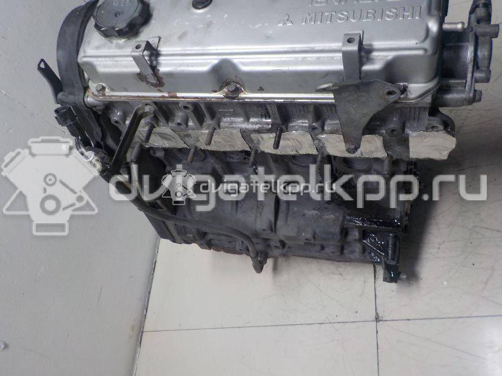Фото Контрактный (б/у) двигатель 4G63 (DOHC 16V) для Mitsubishi Santamo / Lancer / Galant / Space / Outlander 106-150 л.с 16V 2.0 л бензин {forloop.counter}}