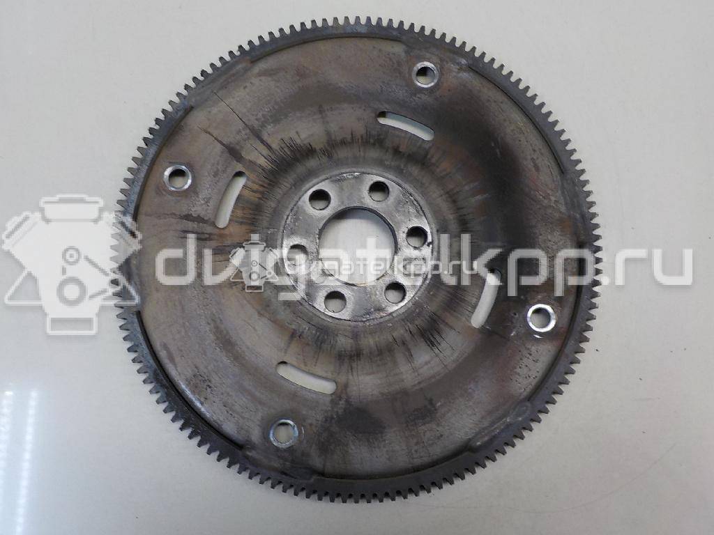 Фото Маховик для двигателя 4G13 (16V) для Mitsubishi Lancer / Space / Colt / Veryca Ca9 W, Ca8 W / Carisma Da 82-88 л.с 16V 1.3 л бензин MN178037 {forloop.counter}}