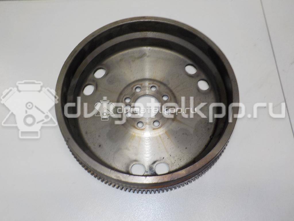 Фото Маховик для двигателя OM 604.910 (OM 604 D22) для Mercedes-Benz C-Class 75-95 л.с 16V 2.2 л Дизельное топливо 6040300205 {forloop.counter}}