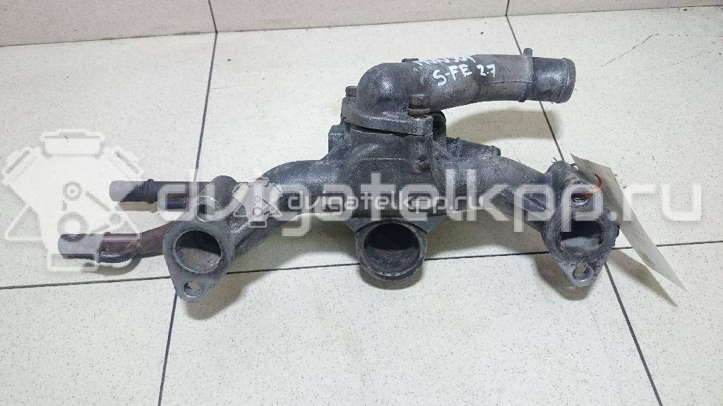 Фото Корпус термостата для двигателя G6EA для Hyundai / Kia 180-194 л.с 24V 2.7 л бензин 256203E200 {forloop.counter}}