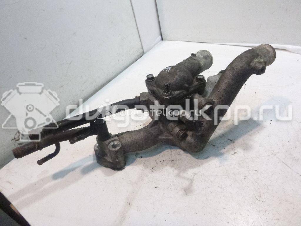 Фото Корпус термостата для двигателя G6EA для Hyundai / Kia 170-194 л.с 24V 2.7 л бензин 256003E200 {forloop.counter}}