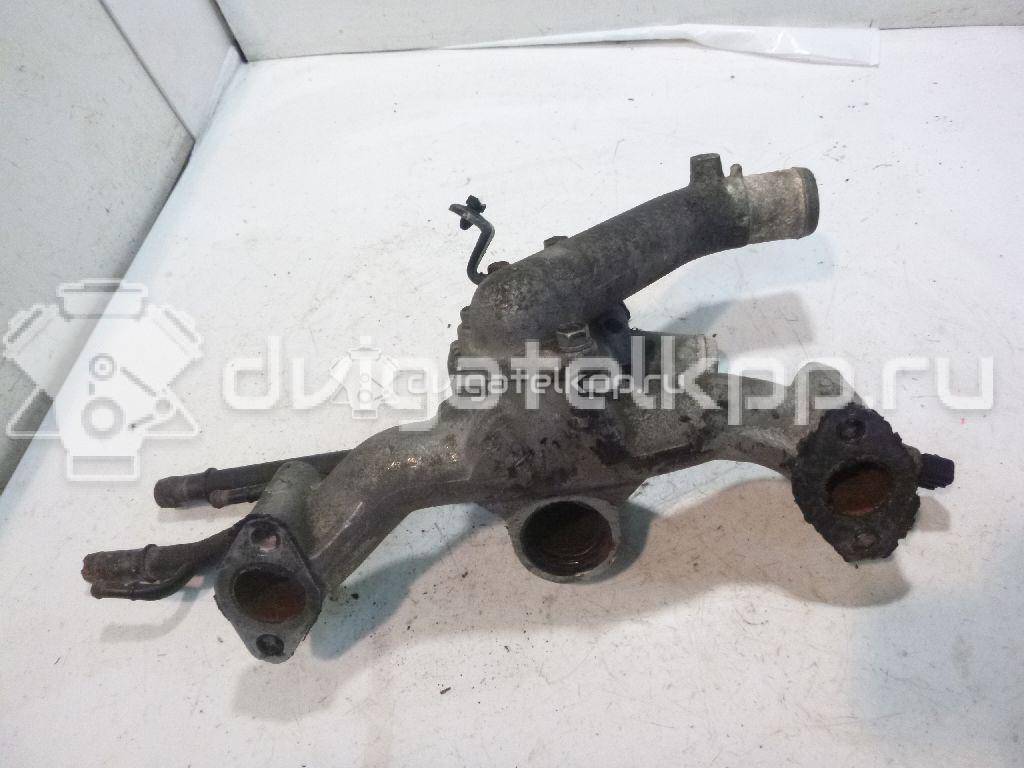 Фото Корпус термостата для двигателя G6EA для Hyundai / Kia 170-194 л.с 24V 2.7 л бензин 256003E200 {forloop.counter}}