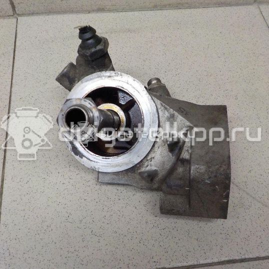 Фото Кронштейн масляного фильтра  050115417 для vw Passat [B5]