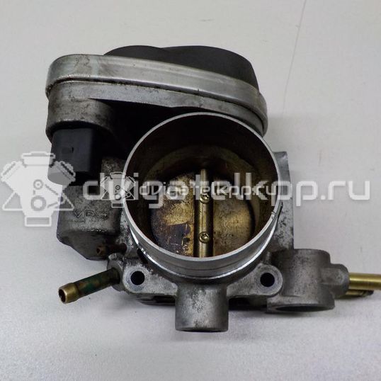 Фото Заслонка дроссельная электрическая  06b133062p для Volkswagen Passat