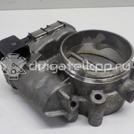 Фото Заслонка дроссельная электрическая  078133062C для vw Passat [B5]