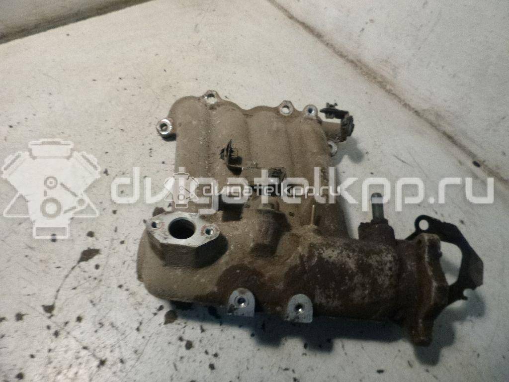 Фото Коллектор впускной для двигателя G4HG для Hyundai / Kia 65 л.с 12V 1.1 л бензин {forloop.counter}}