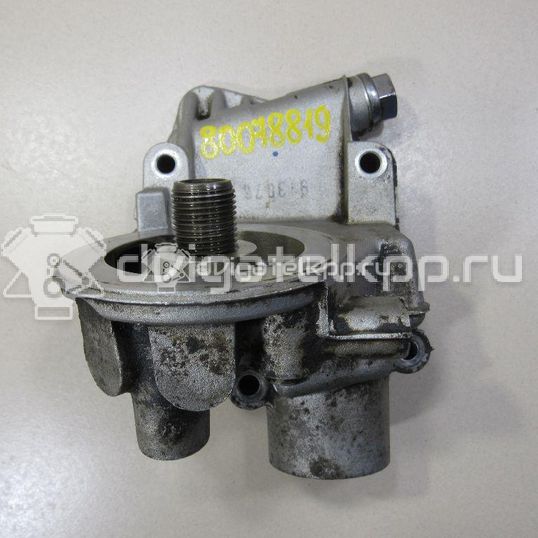 Фото Кронштейн масляного фильтра  06A115417 для Volkswagen / Audi