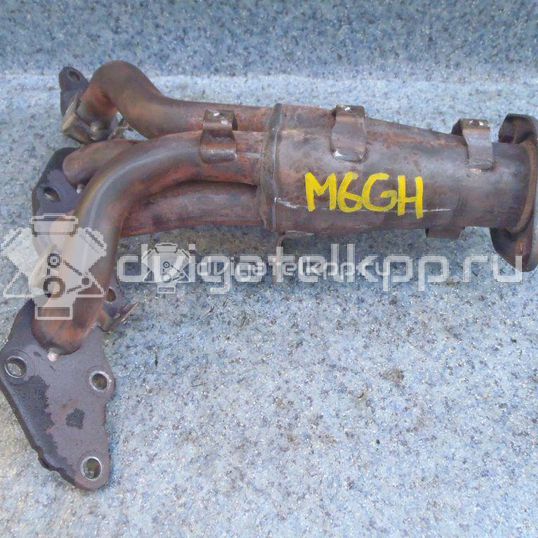 Фото Коллектор выпускной для двигателя FE (16V) для Mazda / Kia 140-148 л.с 16V 2.0 л Супер-бензин (95) неэтилированный