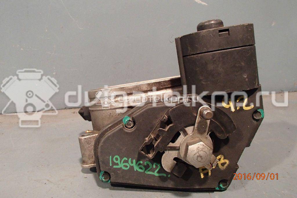 Фото Заслонка дроссельная электрическая  077133063ae для Audi A8 {forloop.counter}}