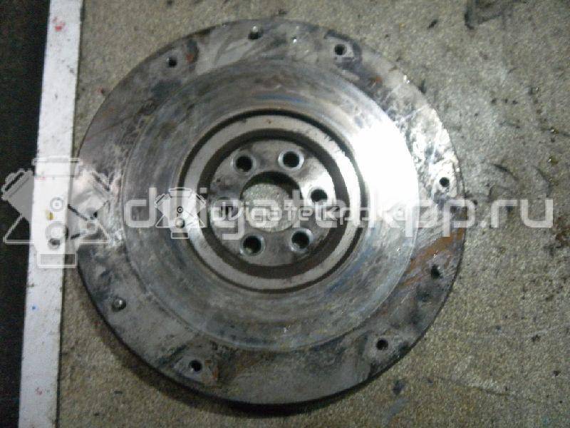 Фото Маховик для двигателя QG16DE для Nissan Sunny / Bluebird / Avenir / Primera / Almera 102-120 л.с 16V 1.6 л бензин {forloop.counter}}