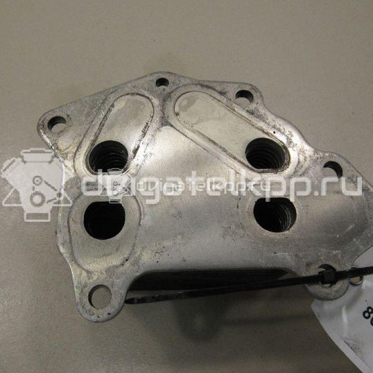Фото Радиатор масляный  1145941 для Ford Fiesta / Focus / C-Max / Fusion Ju