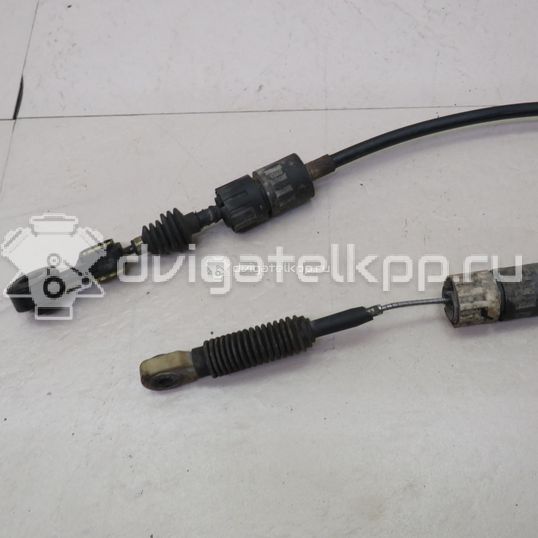 Фото Трос КПП  1490969 для Ford Focus