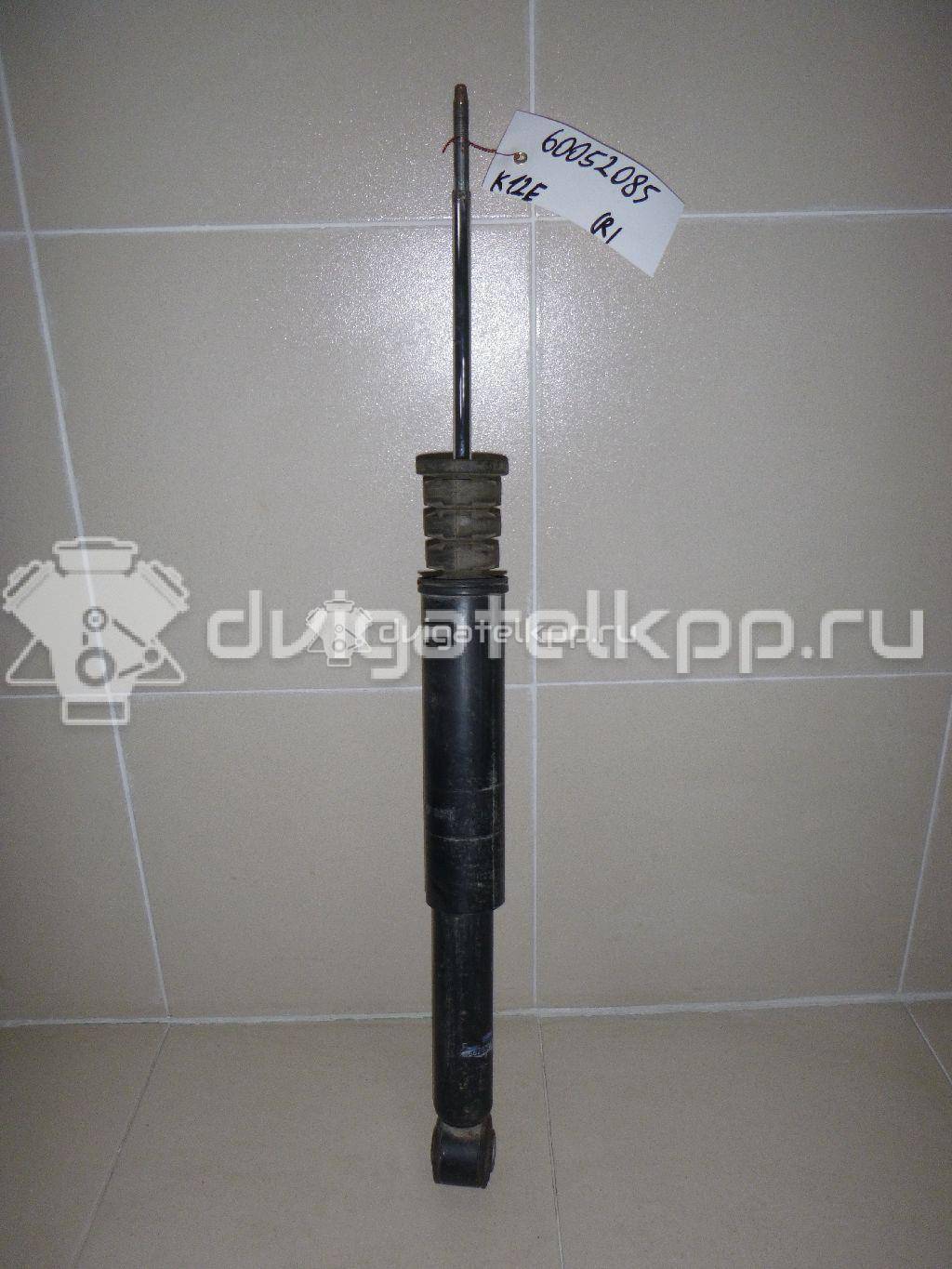Фото Амортизатор задний  E6210AX602 для Nissan Note / Micra {forloop.counter}}