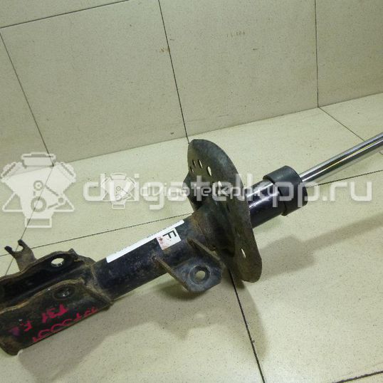 Фото Амортизатор передний левый  54303JG72A для Nissan Qashqai / X-Trail