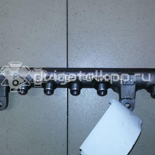 Фото Рейка топливная (рампа)  03L130089A для seat Exeo