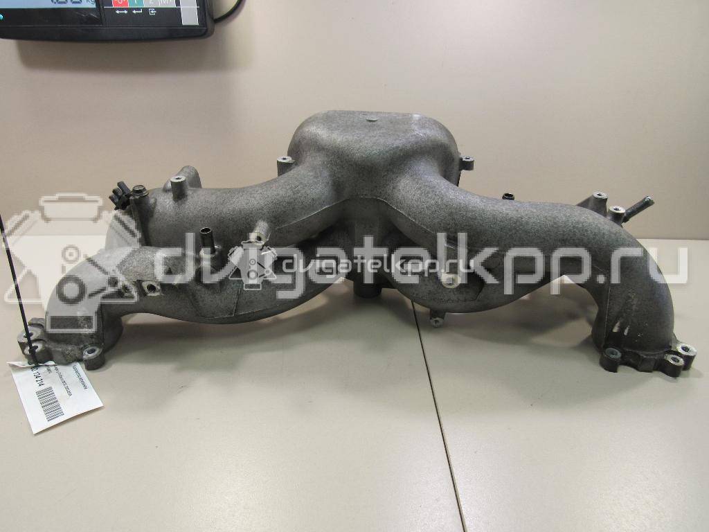 Фото Коллектор впускной для двигателя EJ25 для Subaru Forester / Legacy / Impreza / Outback 152-211 л.с 16V 2.5 л бензин 14001AB610 {forloop.counter}}