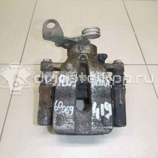Фото Суппорт тормозной задний левый  77364538 для Fiat Punto / Linea 323
