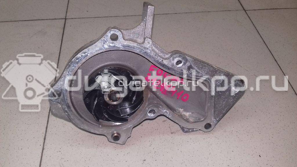 Фото Насос водяной (помпа)  1778516 для Ford Fiesta / Focus / Tourneo / C-Max / Ka {forloop.counter}}