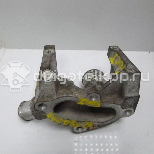 Фото Фланец двигателя системы охлаждения  1301772 для Ford Fiesta / Focus / Puma Ec