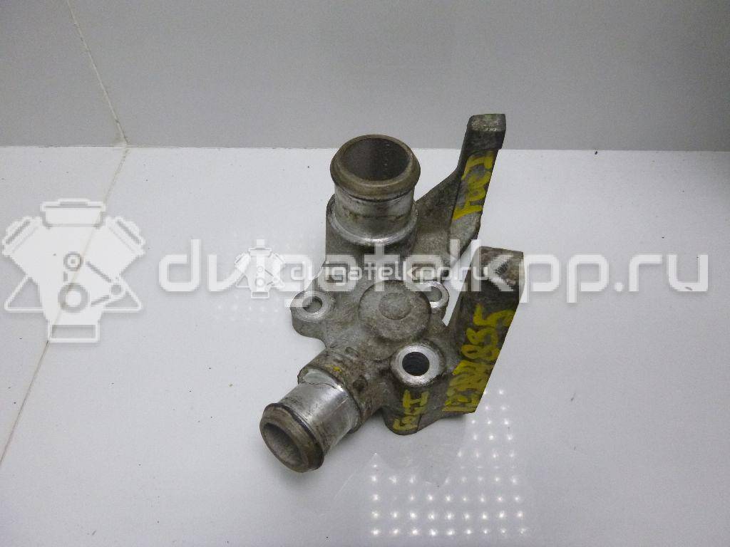 Фото Фланец двигателя системы охлаждения  1301772 для Ford Fiesta / Focus / Puma Ec {forloop.counter}}