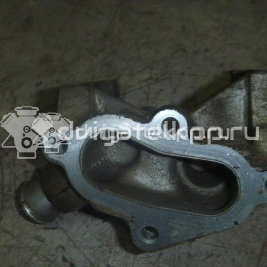 Фото Фланец двигателя системы охлаждения  1301772 для Ford Fiesta / Focus / Puma Ec