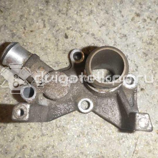 Фото Фланец двигателя системы охлаждения  1301772 для Ford Fiesta / Focus / Puma Ec