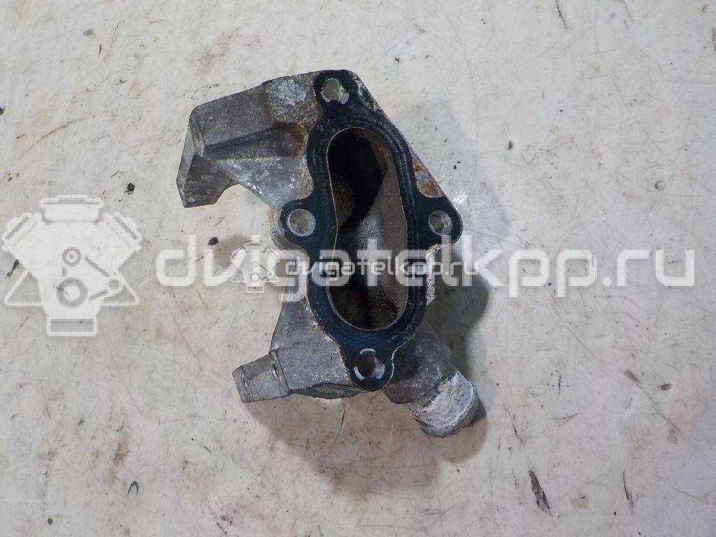 Фото Фланец двигателя системы охлаждения  1301772 для Ford Fiesta / Focus / Puma Ec {forloop.counter}}