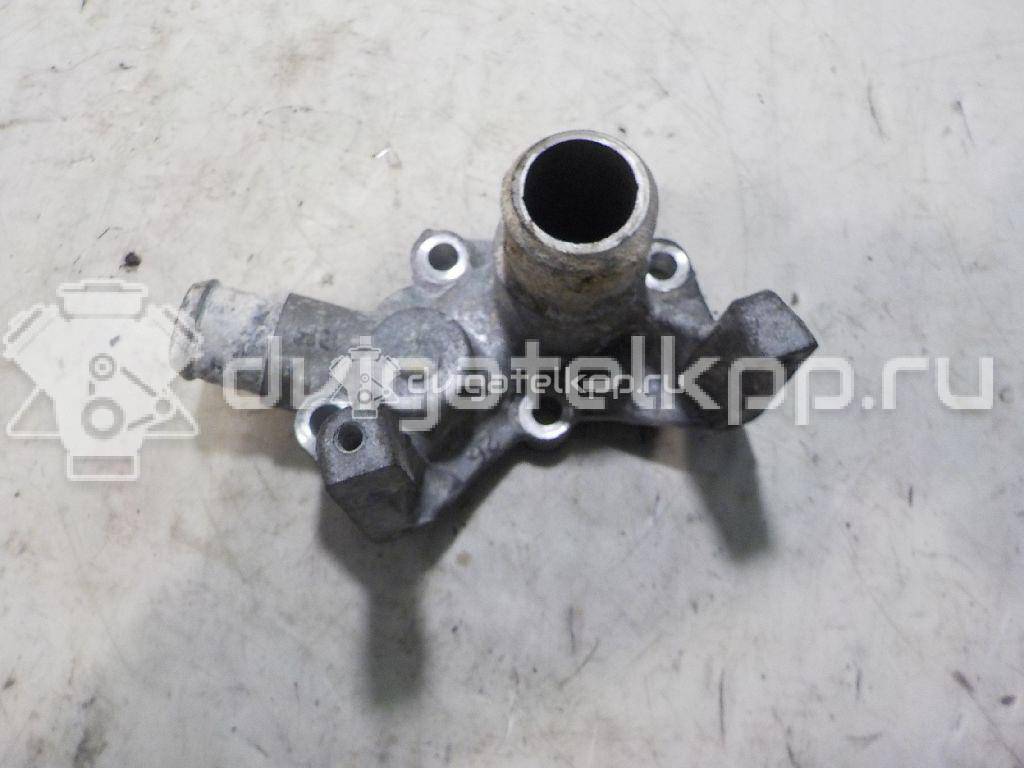 Фото Фланец двигателя системы охлаждения  1301772 для Ford Fiesta / Focus / Puma Ec {forloop.counter}}