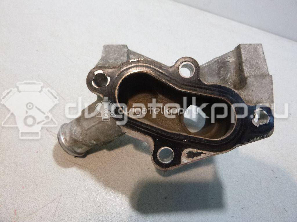 Фото Фланец двигателя системы охлаждения  1301772 для Ford Fiesta / Focus / Puma Ec {forloop.counter}}