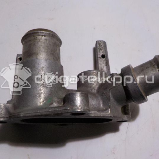 Фото Фланец двигателя системы охлаждения  1301772 для Ford Fiesta / Focus / Puma Ec