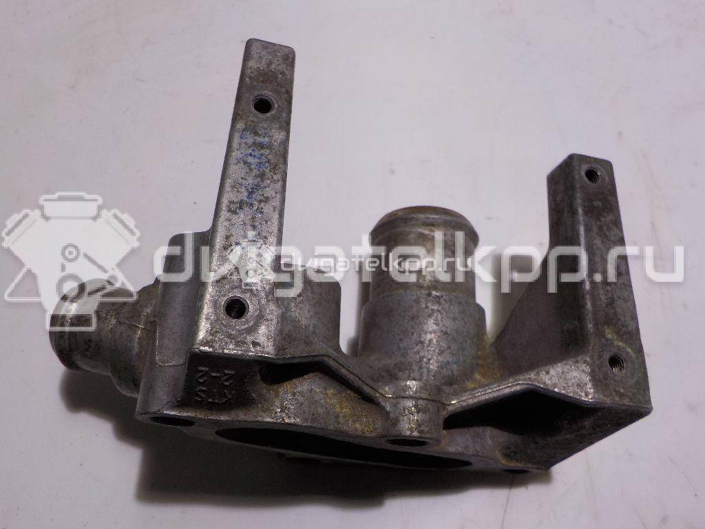 Фото Фланец двигателя системы охлаждения  1301772 для Ford Fiesta / Focus / Puma Ec {forloop.counter}}