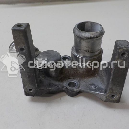 Фото Фланец двигателя системы охлаждения  1301772 для Ford Fiesta / Focus / Puma Ec