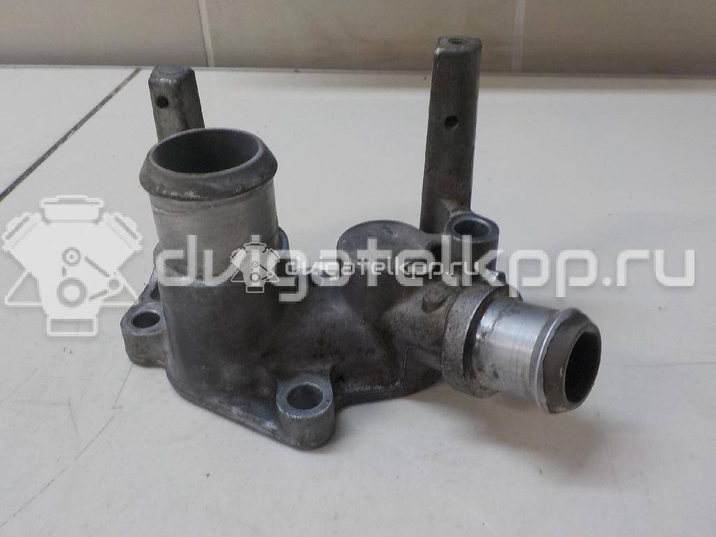 Фото Фланец двигателя системы охлаждения  1301772 для Ford Fiesta / Focus / Puma Ec {forloop.counter}}