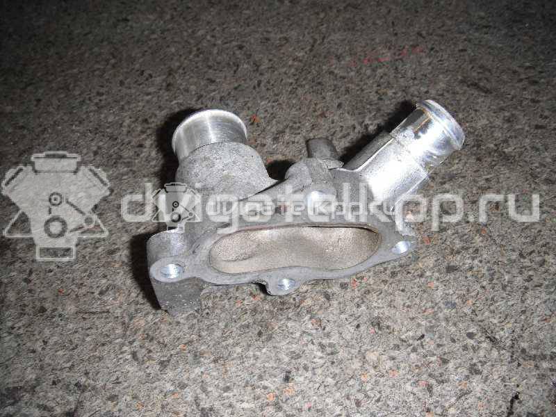 Фото Фланец двигателя системы охлаждения  1301772 для Ford Fiesta / Focus / Puma Ec {forloop.counter}}