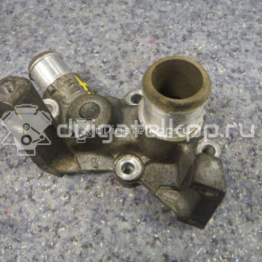Фото Фланец двигателя системы охлаждения  1301772 для Ford Fiesta / Focus / Puma Ec